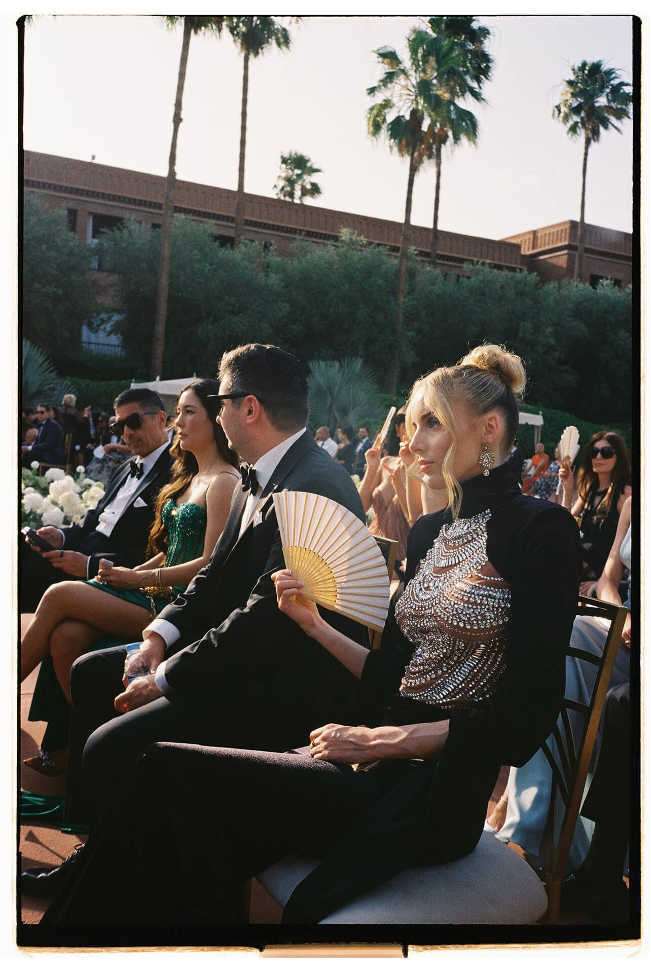 Guests seated outdoors during destination wedding ceremony in Morocco