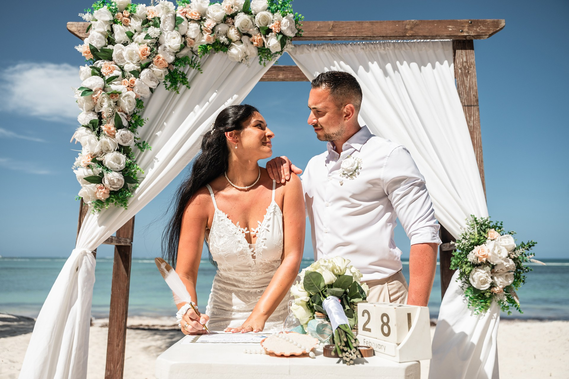 newlyweds walking beach Punta Cana elopement photos