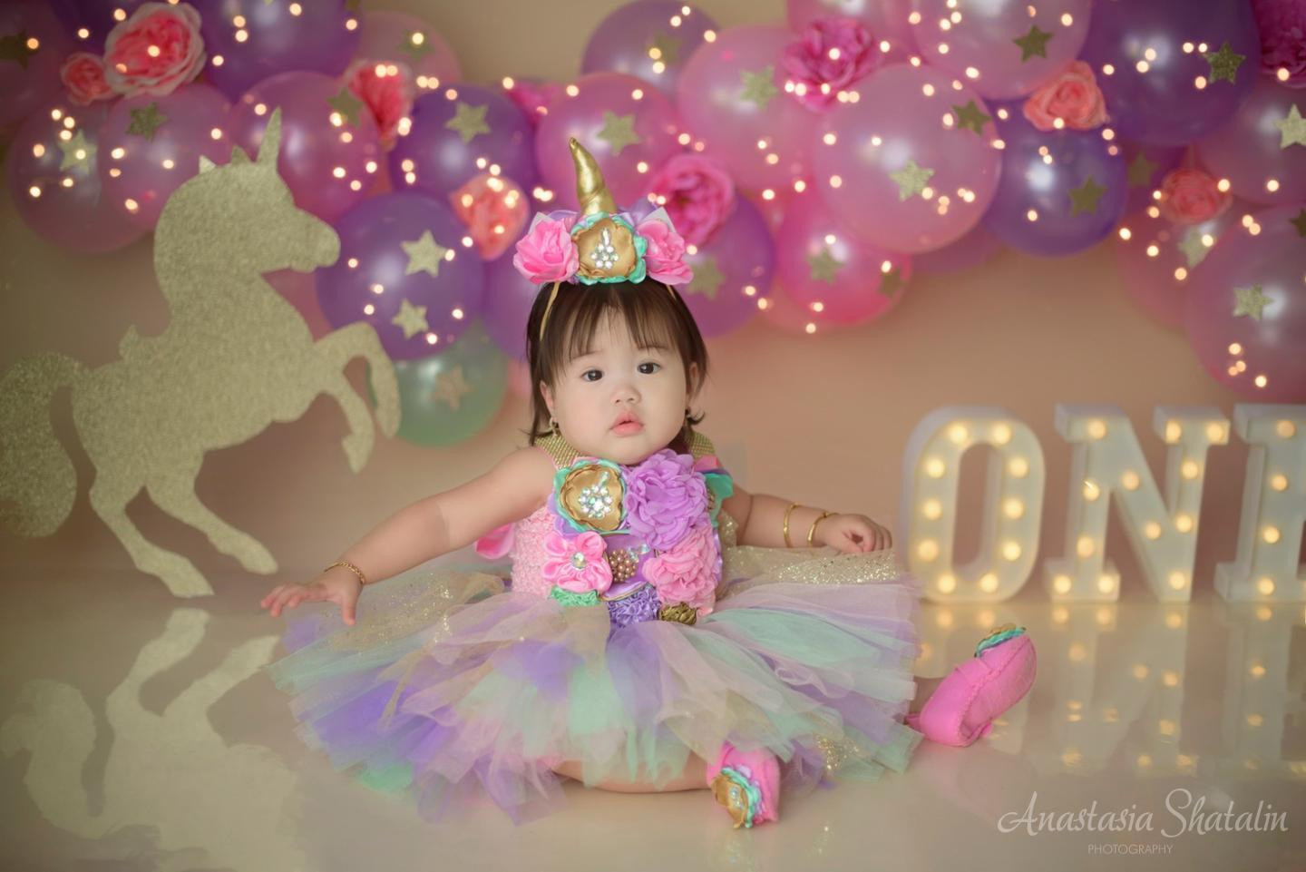 Unicorn first birthday photography session Rocklin. Family photographer in Roseville, Rocklin, Folsom, Sacramento