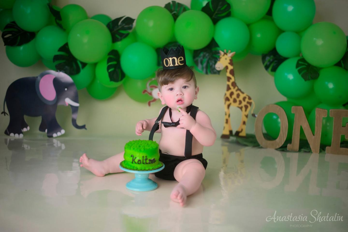 Tarzan jungle cake smash photography Sacramento. Family photographer in Roseville, Rocklin, Folsom, Sacramento
