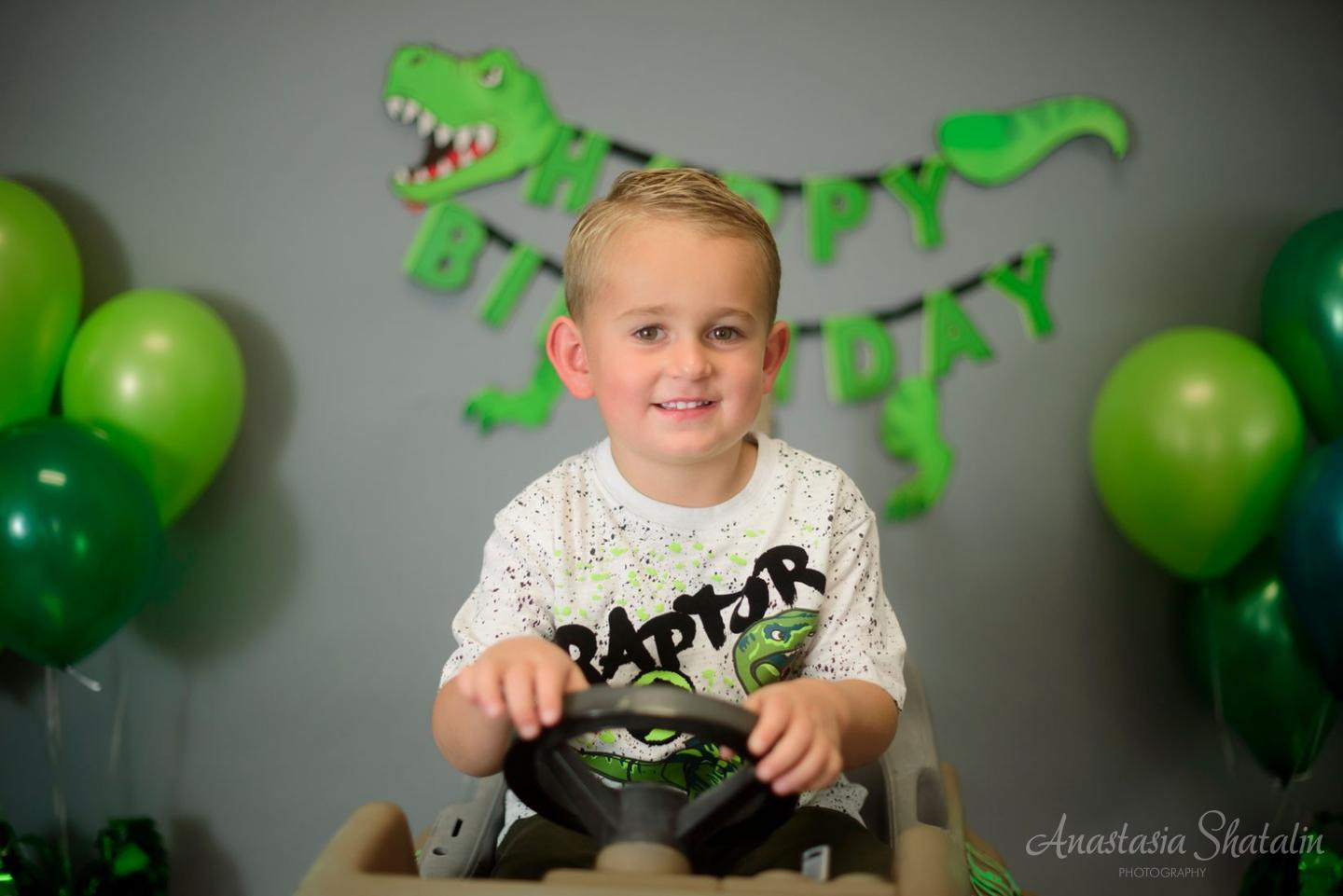 Dinosaur monster truck decorated birthday photography in Lincoln, CA. Family photographer in Roseville, Rocklin, Folsom, Sacramento