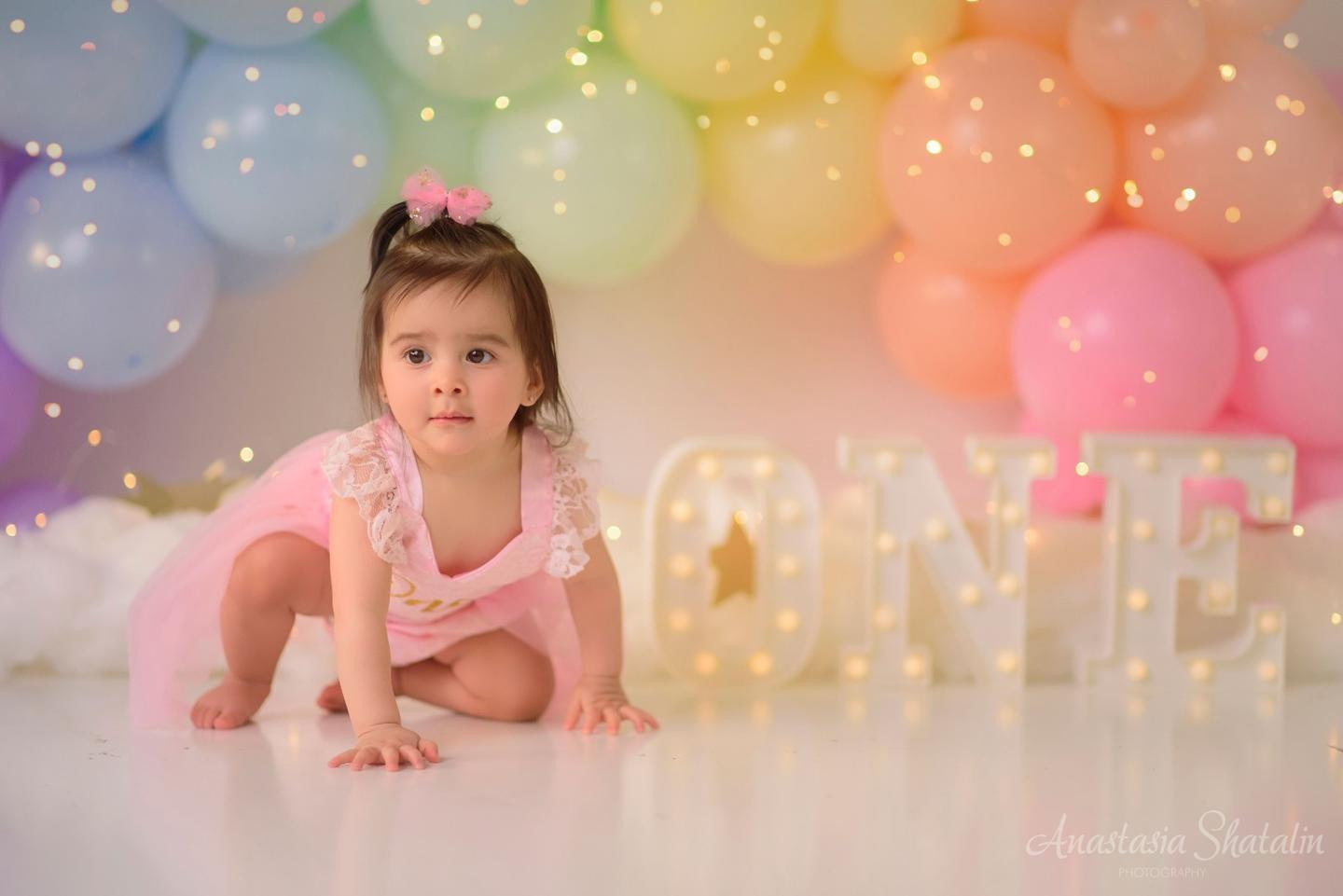 Rainbow cake smash Sacramento, Roseville, Rocklin baby photographer. Family photographer in Roseville, Rocklin, Folsom, Sacramento