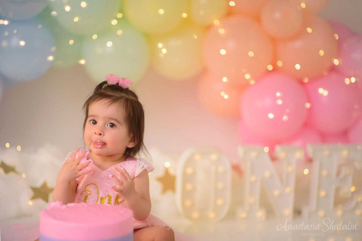 Rainbow cake smash Sacramento, Roseville, Rocklin baby photographer. Family photographer in Roseville, Rocklin, Folsom, Sacramento
