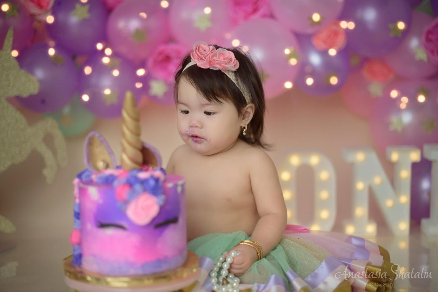 Unicorn first birthday photography session Rocklin. Family photographer in Roseville, Rocklin, Folsom, Sacramento