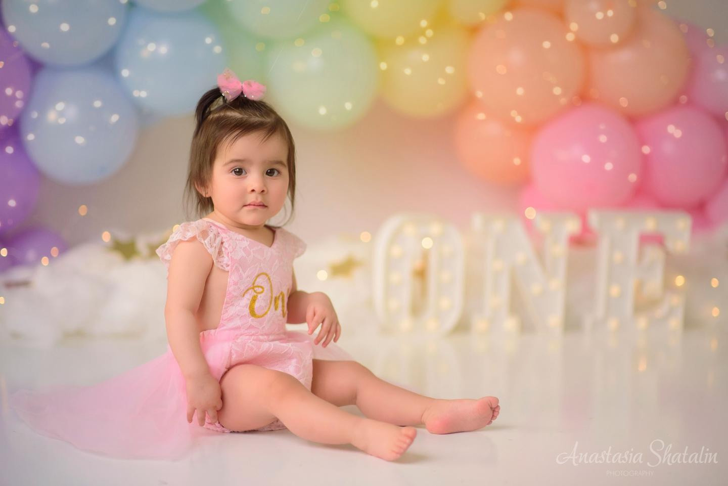 Rainbow cake smash Sacramento, Roseville, Rocklin baby photographer. Family photographer in Roseville, Rocklin, Folsom, Sacramento