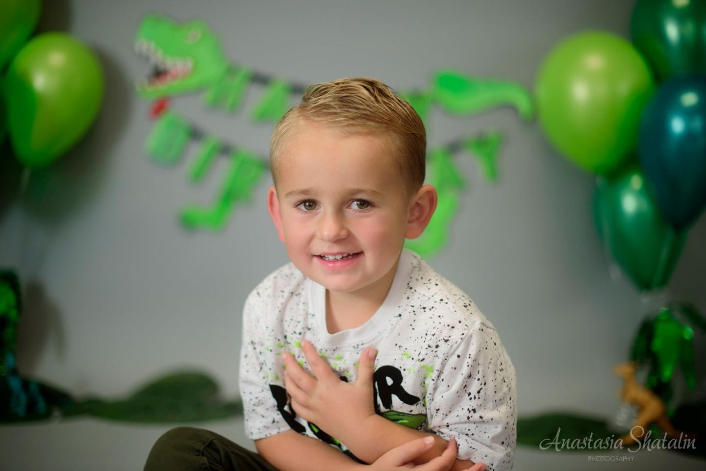 Dinosaur monster truck decorated birthday photography in Lincoln, CA. Family photographer in Roseville, Rocklin, Folsom, Sacramento