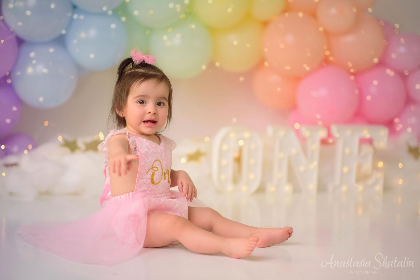 Rainbow cake smash Sacramento, Roseville, Rocklin baby photographer. Family photographer in Roseville, Rocklin, Folsom, Sacramento