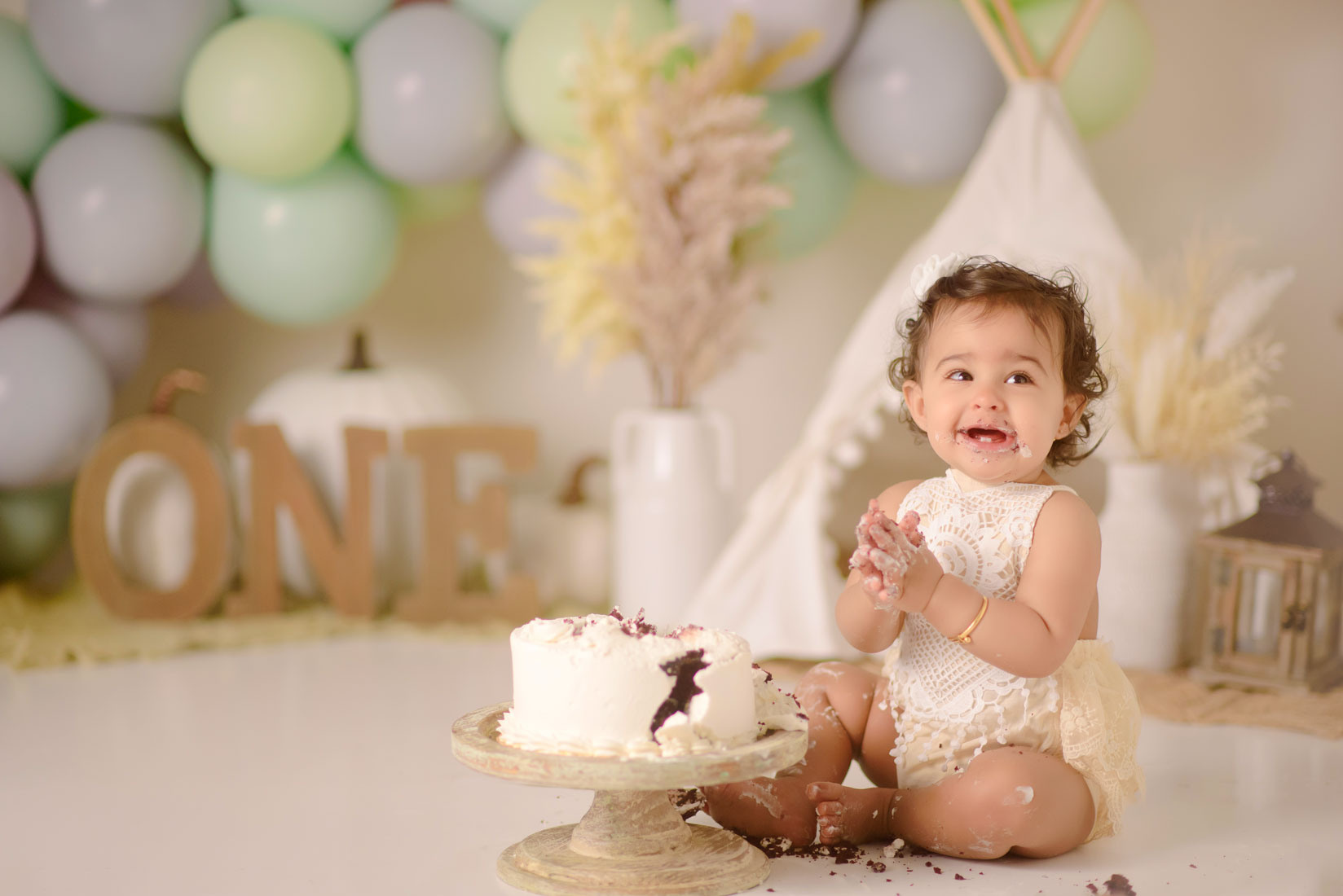 Boho fall cake smash studio photography Roseville, Rocklin. Family photographer in Roseville, Rocklin, Folsom, Sacramento