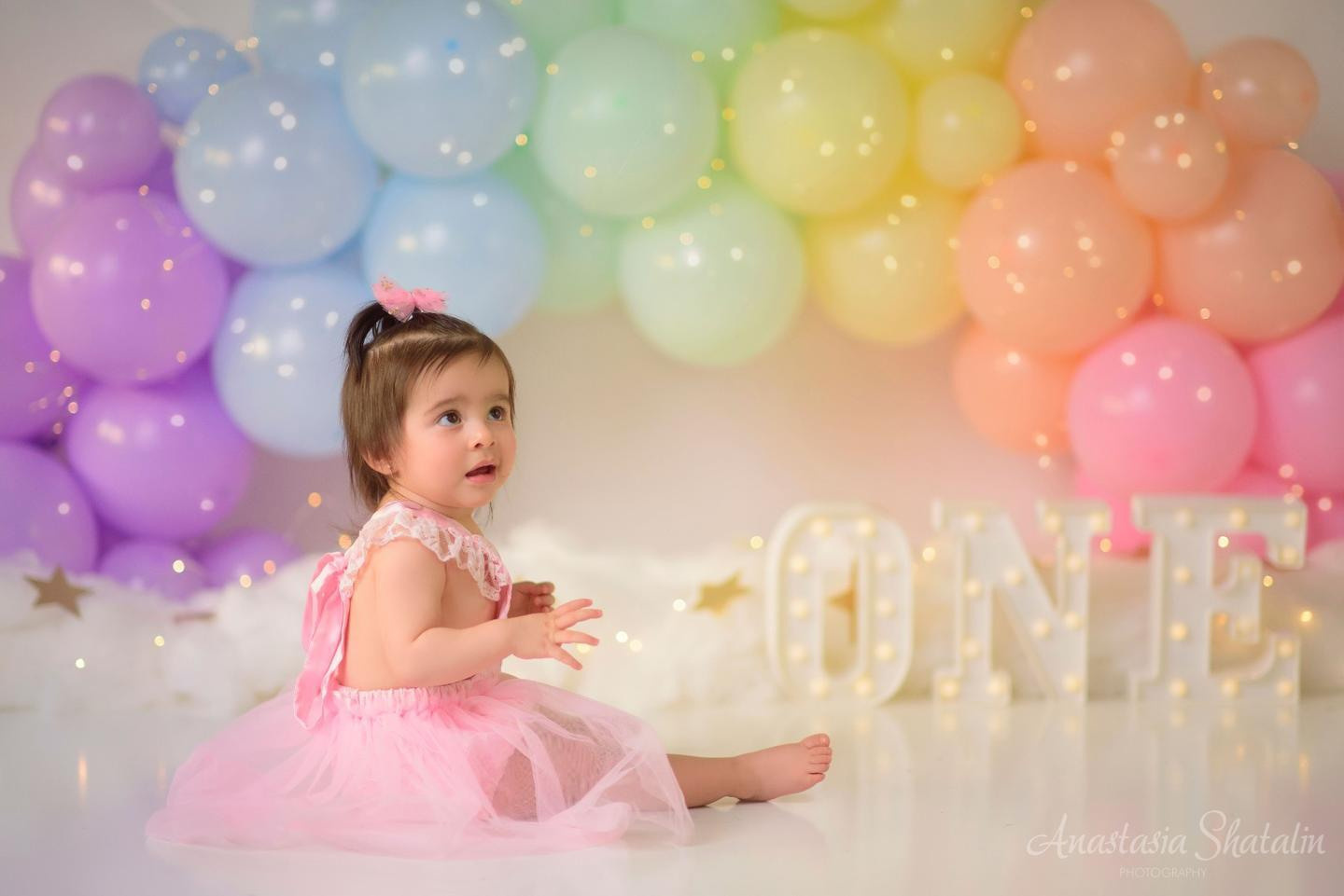 Rainbow cake smash Sacramento, Roseville, Rocklin baby photographer. Family photographer in Roseville, Rocklin, Folsom, Sacramento