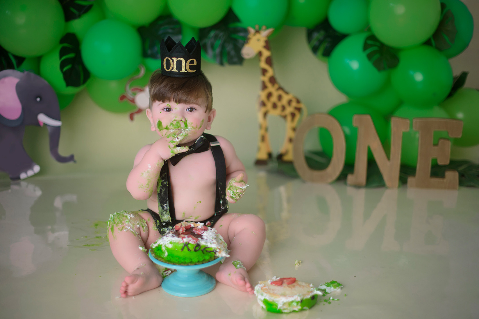 Tarzan jungle cake smash photography Sacramento. Family photographer in Roseville, Rocklin, Folsom, Sacramento