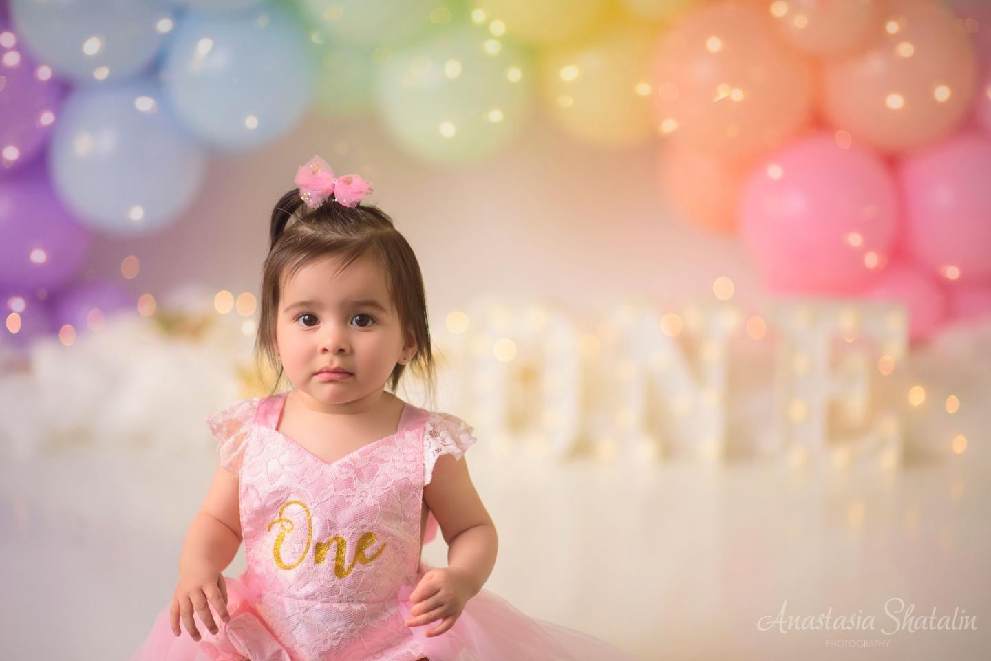 Rainbow cake smash Sacramento, Roseville, Rocklin baby photographer. Family photographer in Roseville, Rocklin, Folsom, Sacramento