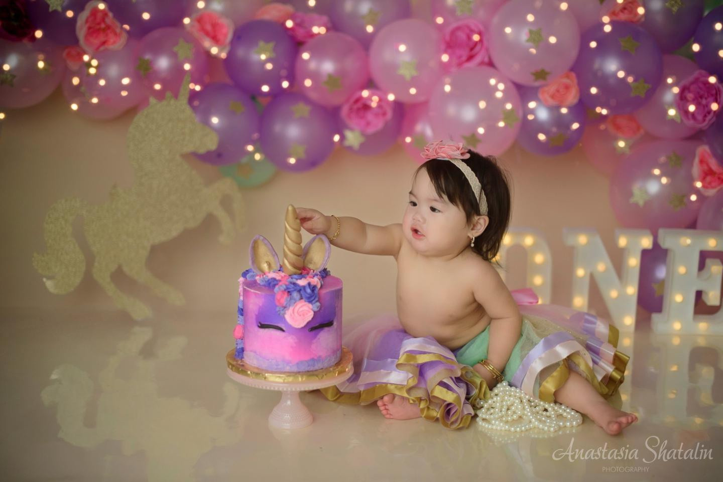 Unicorn first birthday photography session Rocklin. Family photographer in Roseville, Rocklin, Folsom, Sacramento