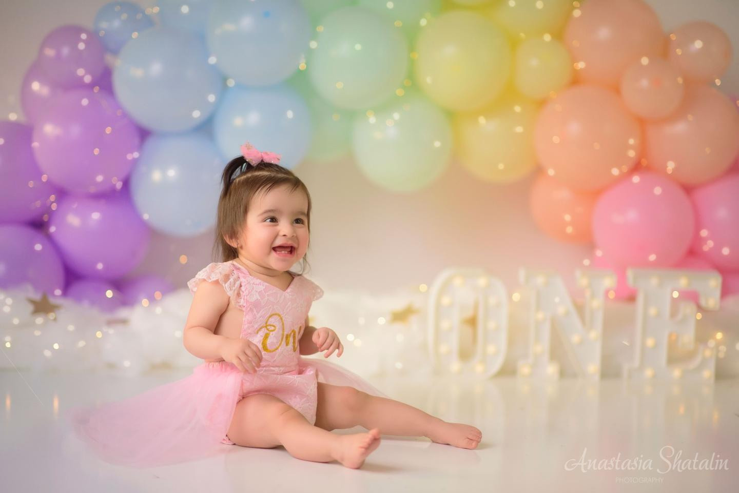 Rainbow cake smash Sacramento, Roseville, Rocklin baby photographer. Family photographer in Roseville, Rocklin, Folsom, Sacramento