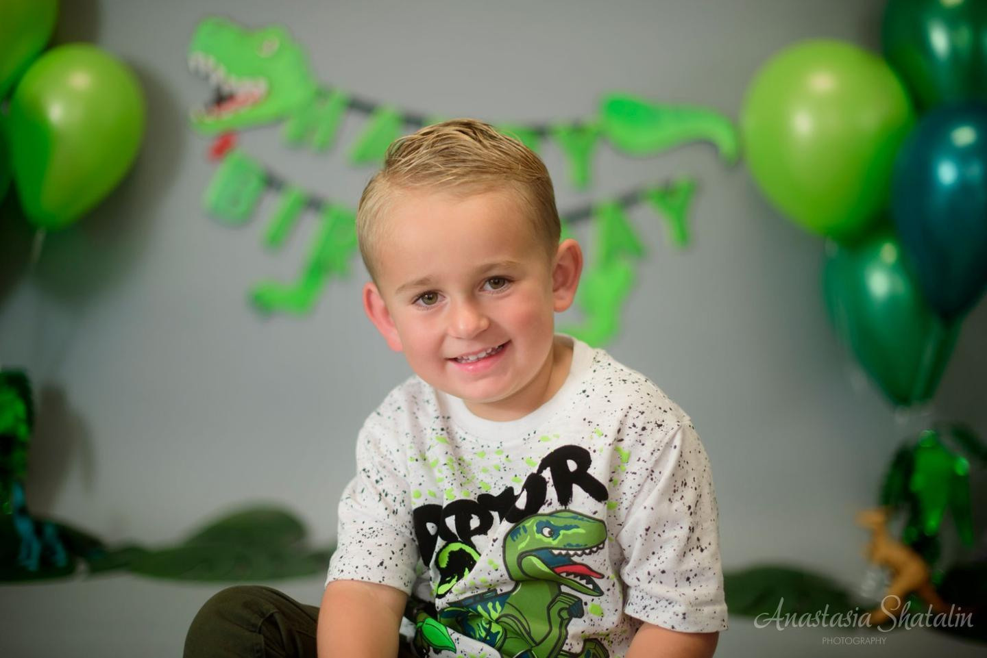 Dinosaur monster truck decorated birthday photography in Lincoln, CA. Family photographer in Roseville, Rocklin, Folsom, Sacramento