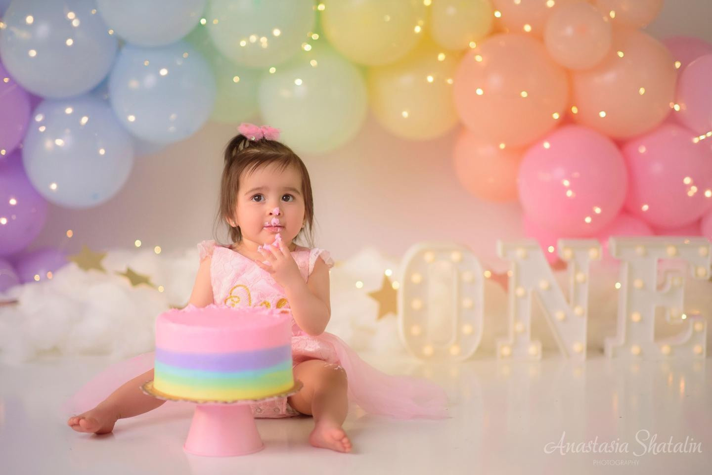 Rainbow cake smash Sacramento, Roseville, Rocklin baby photographer. Family photographer in Roseville, Rocklin, Folsom, Sacramento