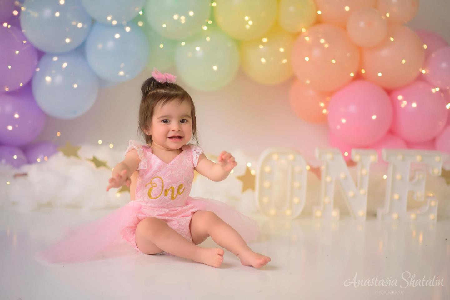 Rainbow cake smash Sacramento, Roseville, Rocklin baby photographer. Family photographer in Roseville, Rocklin, Folsom, Sacramento