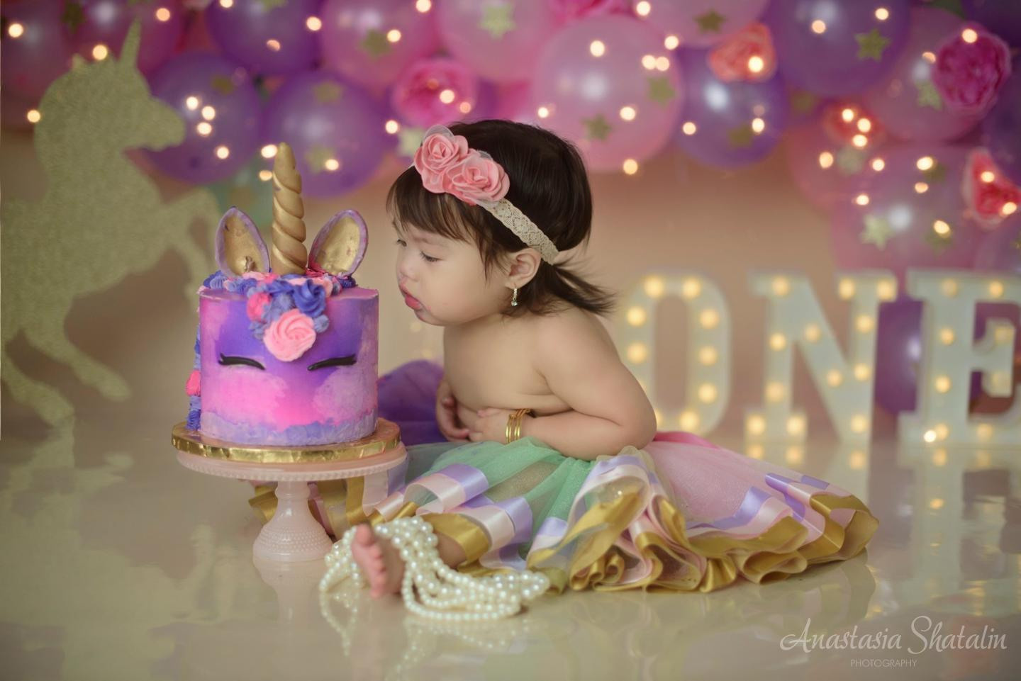 Unicorn first birthday photography session Rocklin. Family photographer in Roseville, Rocklin, Folsom, Sacramento