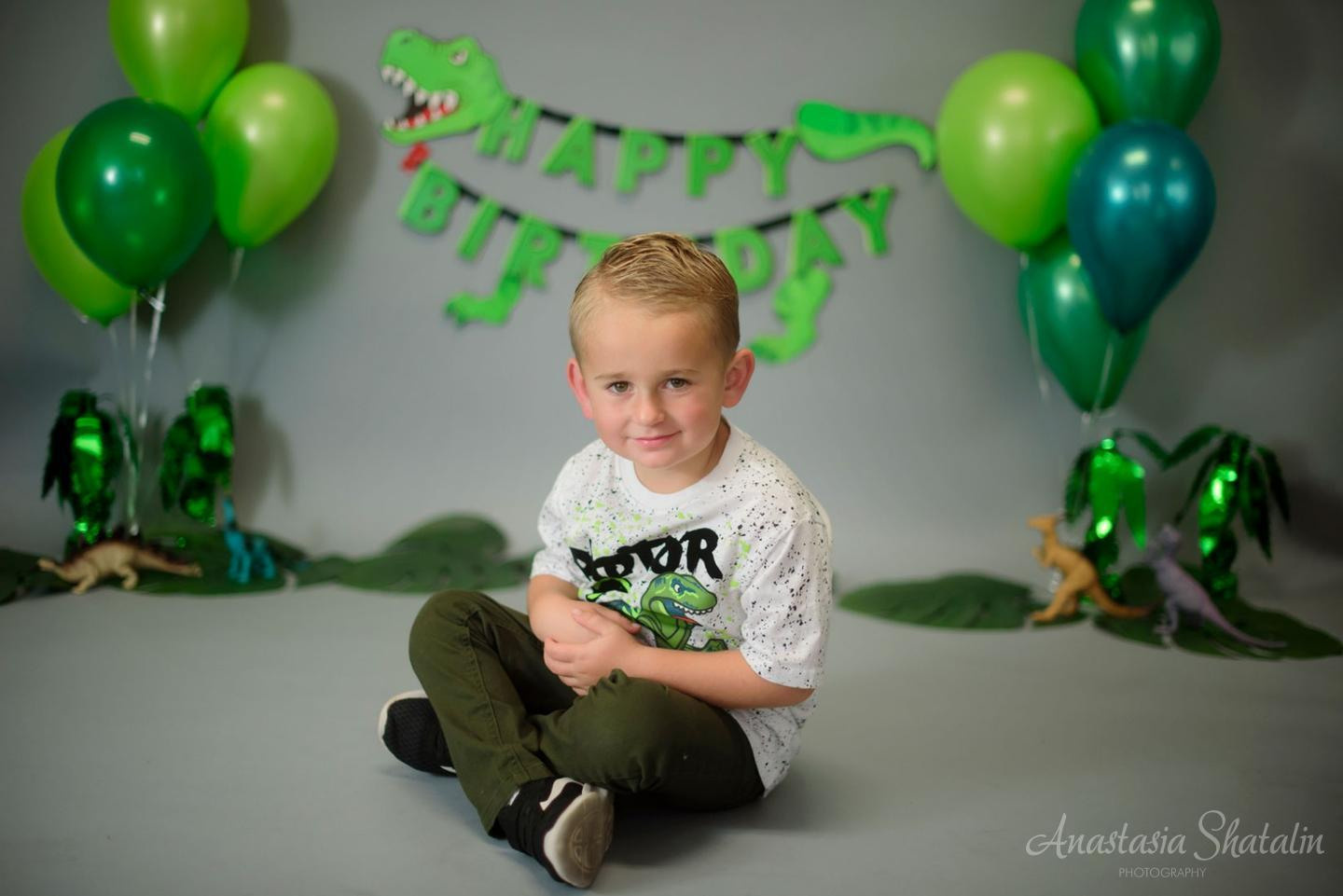 Dinosaur monster truck decorated birthday photography in Lincoln, CA. Family photographer in Roseville, Rocklin, Folsom, Sacramento