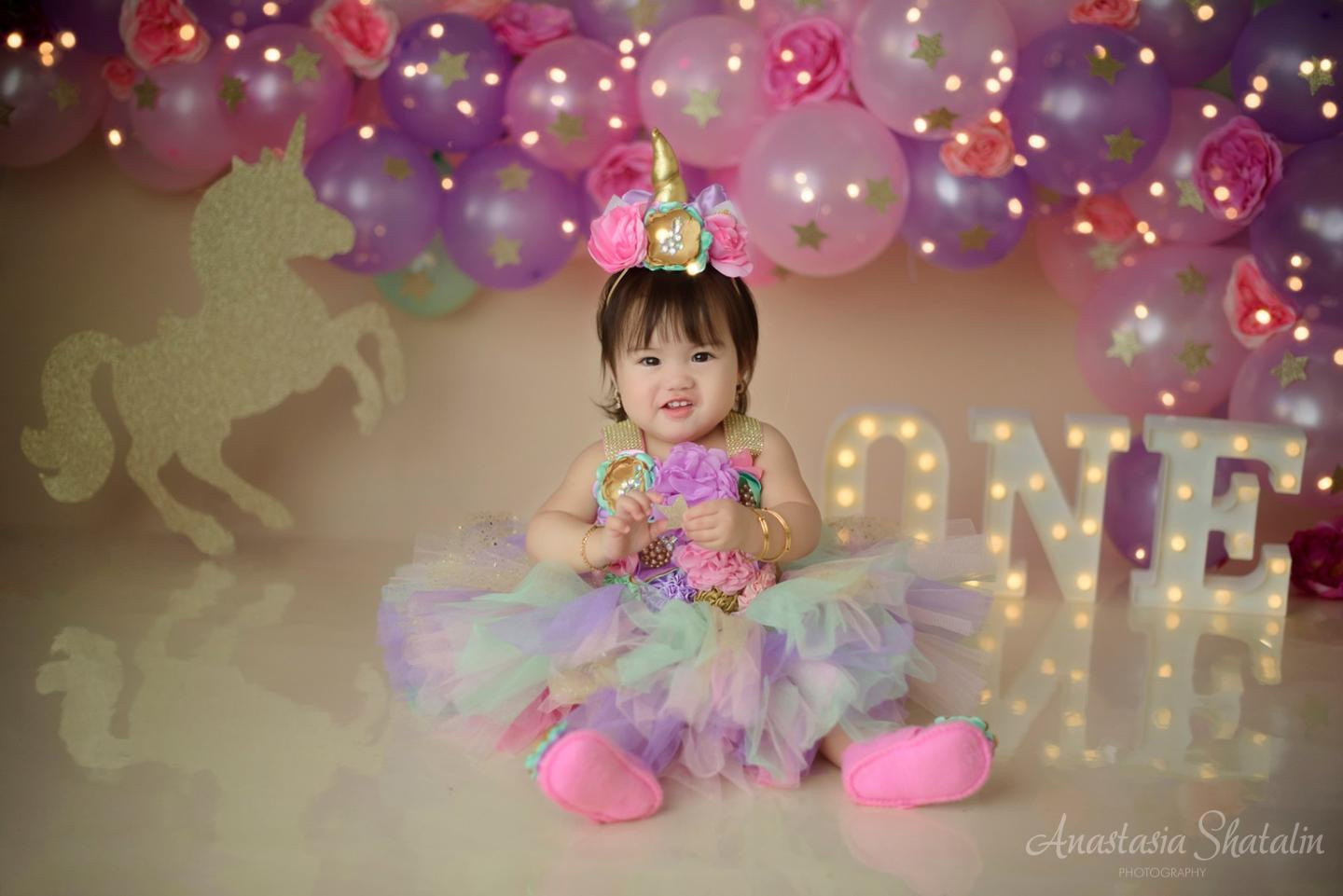 Unicorn first birthday photography session Rocklin. Family photographer in Roseville, Rocklin, Folsom, Sacramento