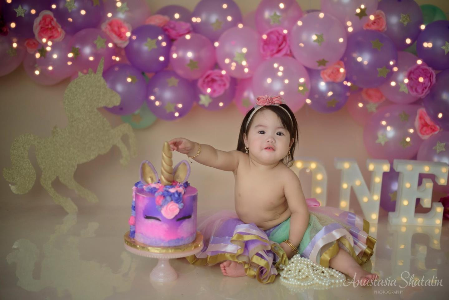 Unicorn first birthday photography session Rocklin. Family photographer in Roseville, Rocklin, Folsom, Sacramento