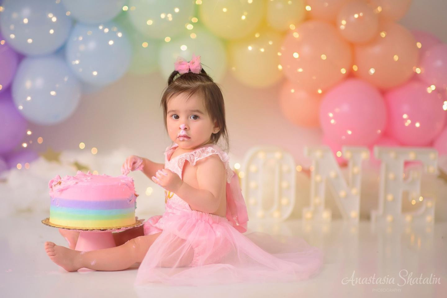 Rainbow cake smash Sacramento, Roseville, Rocklin baby photographer. Family photographer in Roseville, Rocklin, Folsom, Sacramento