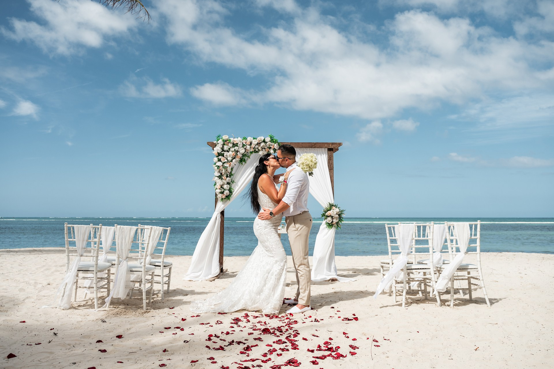 happy couple vow renewal Punta Cana tropical setting