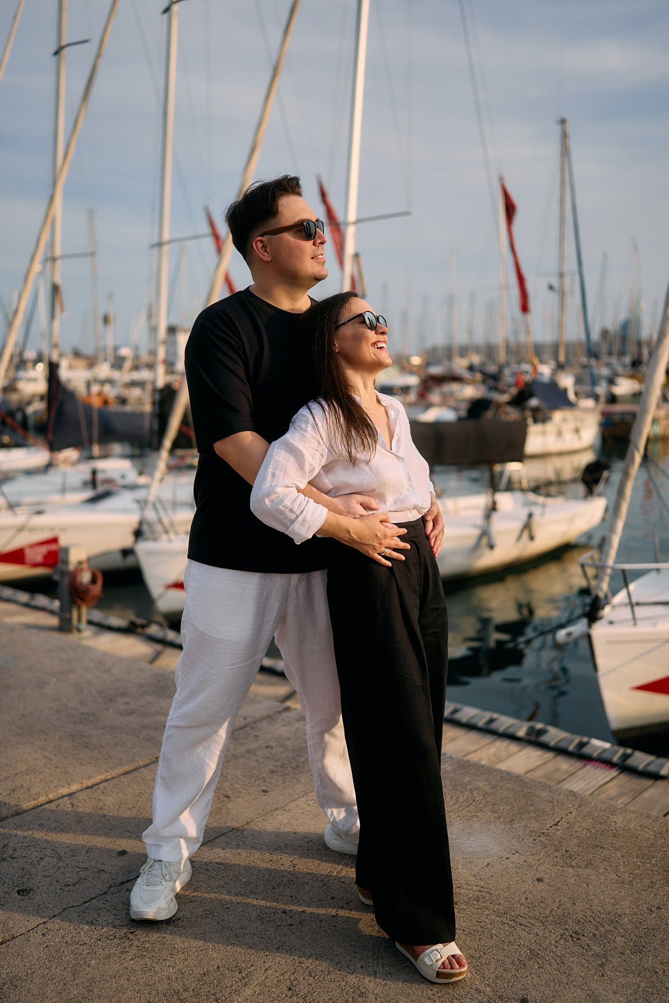 Description of the Port Olimpic location for a  love-story or individual photo shoot in Barcelona, examples of photos taken at this spot. POSTCARD.BCN Photographer Kate in Barcelona. Love-story, family or individual photo shoots