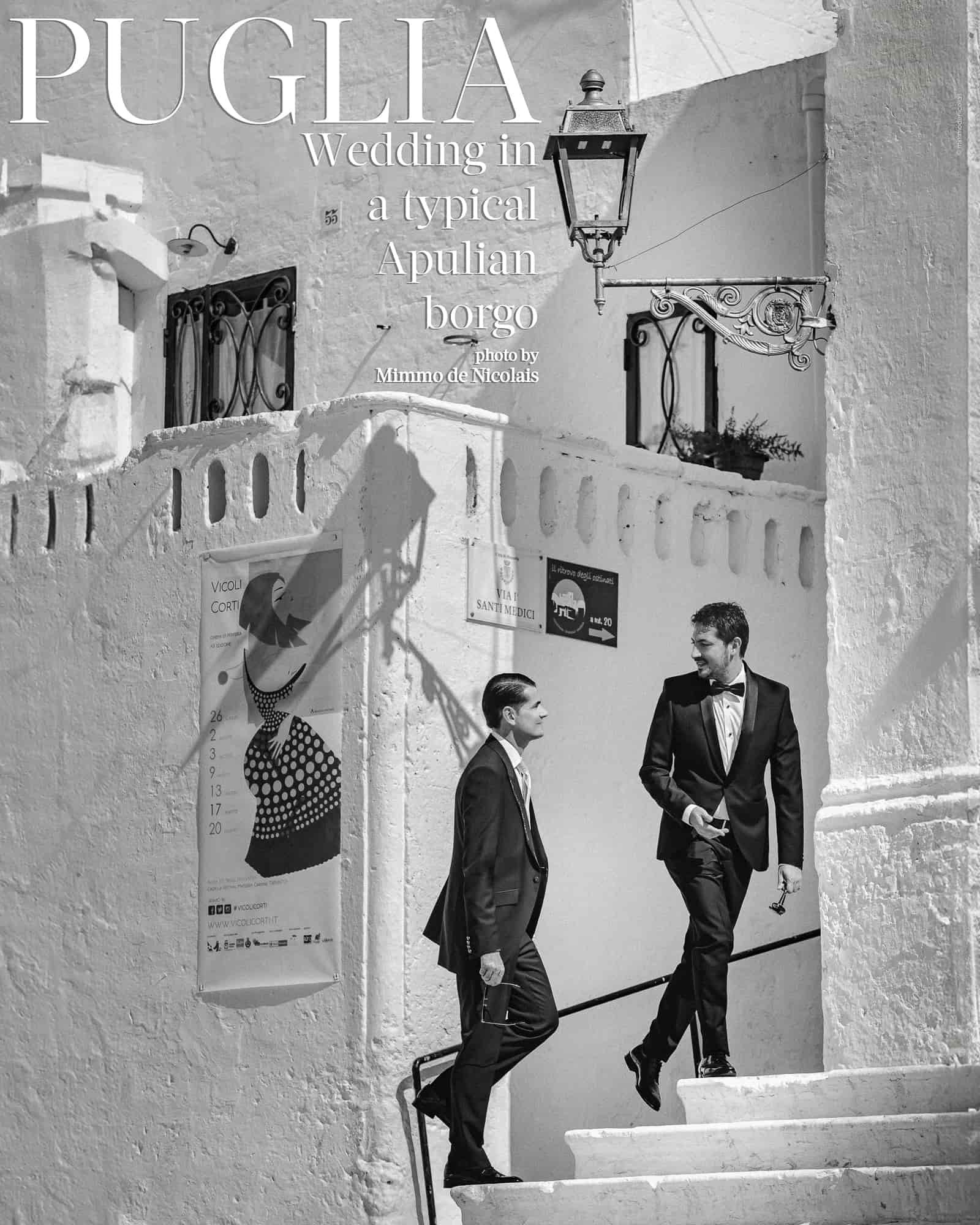 Italy destination wedding photographer Puglia Mimmo De Nicolais: Groom and his brother in a picturesque Apulian borgo. Venue at Castello Marchione, Puglia.