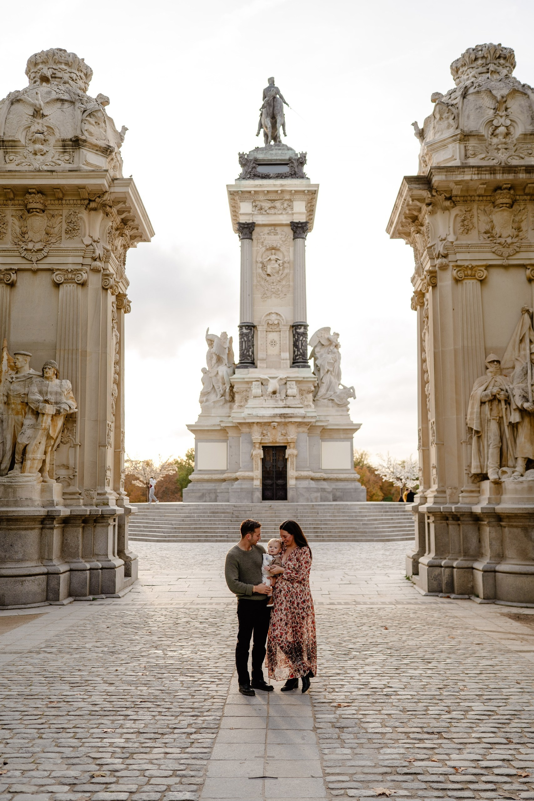 Couple with baby in Retiro Park, Madrid