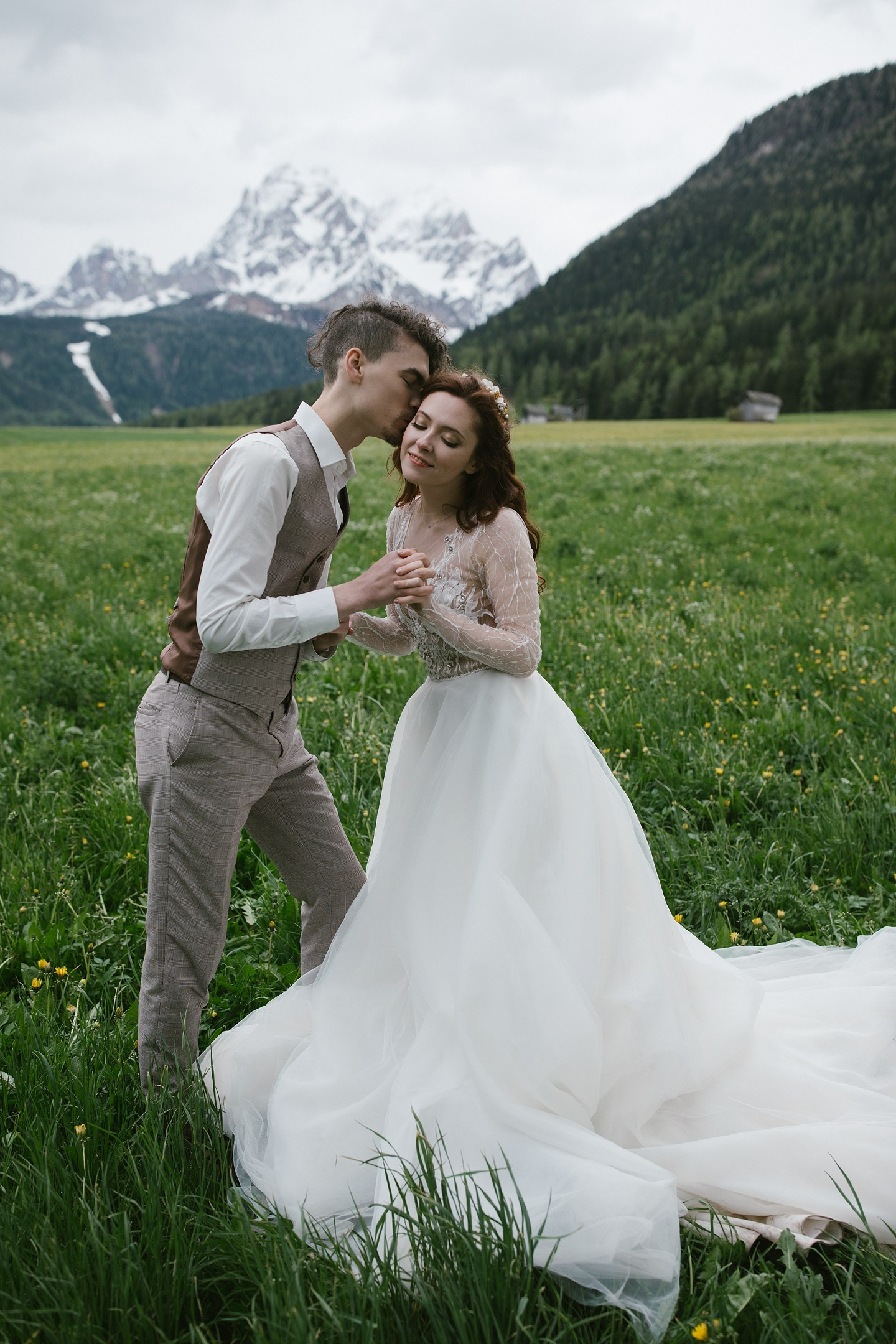 Tender kiss in the Dolomites, quiet and soft