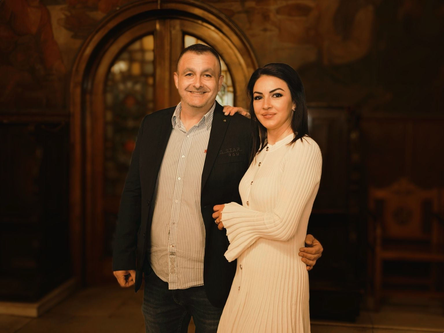 parents during baptism ceremony emotional church moment