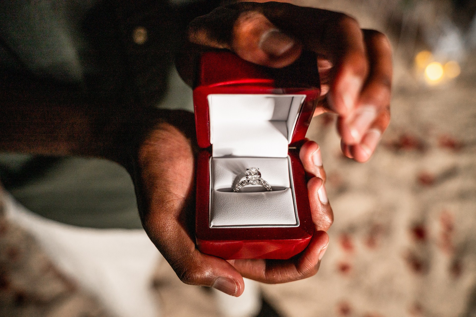 Beautiful romantic beach proposal with red rose heart arch in Punta Cana