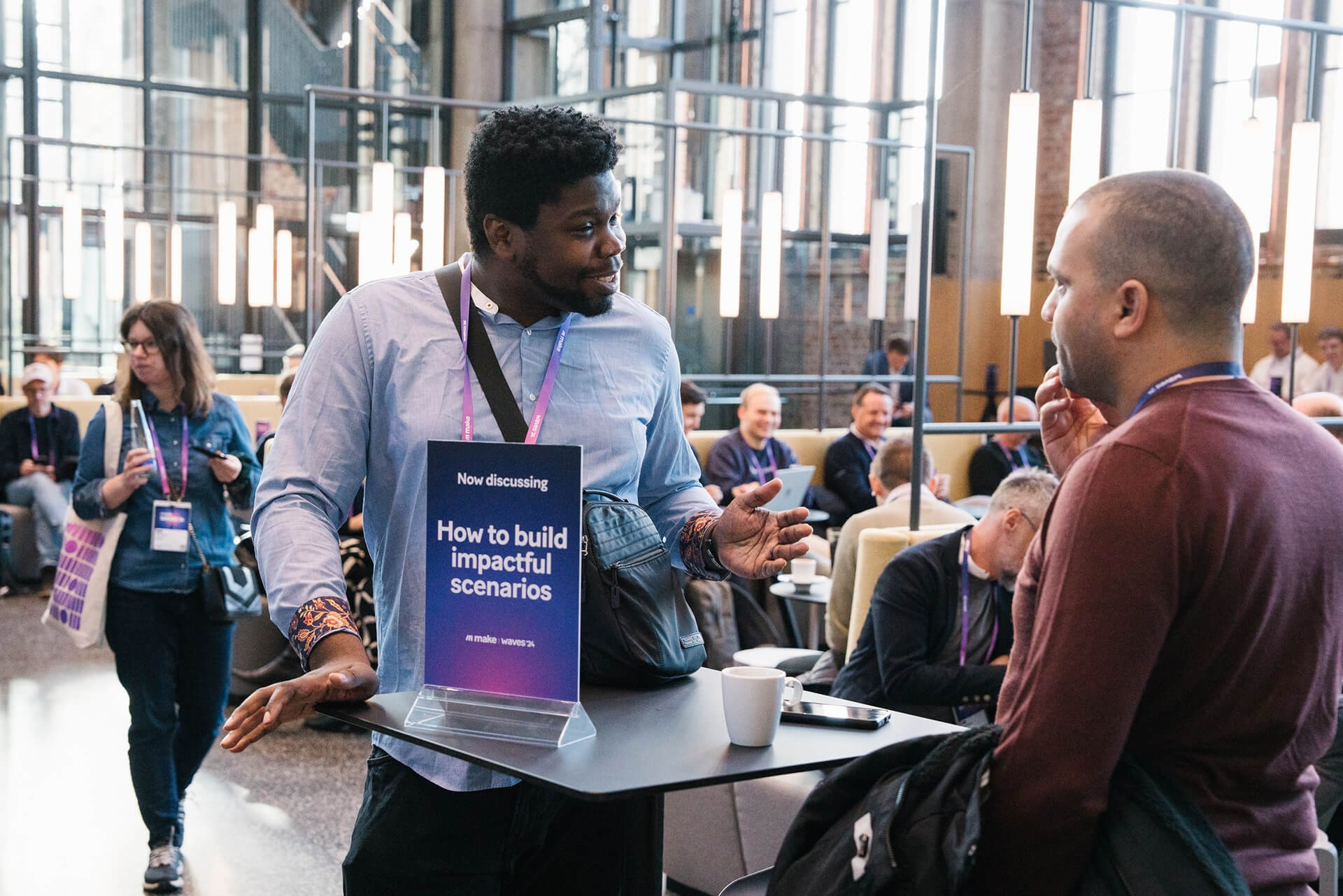 Business meeting between two delegates at a Milan tech conference in Italy