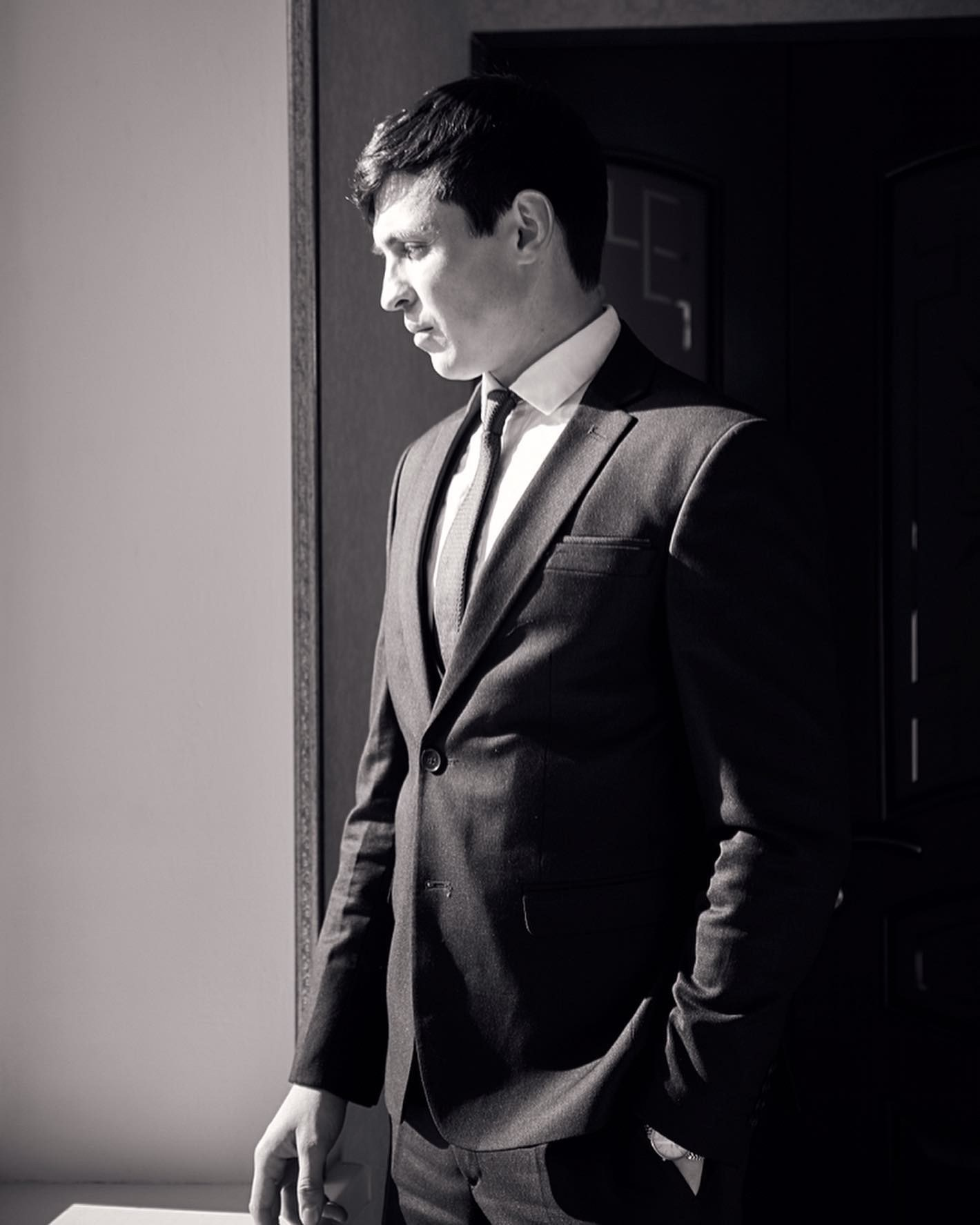 Stylish groom wearing a classic wedding suit